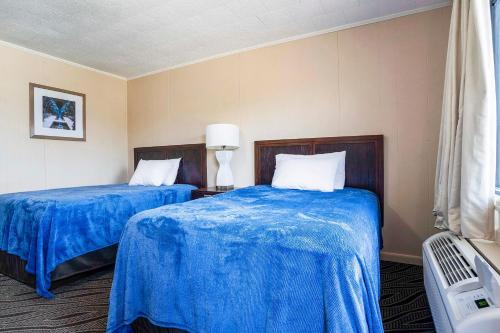 Katil atau katil-katil dalam bilik di OYO Hotel Opp AL, Floral Hwy