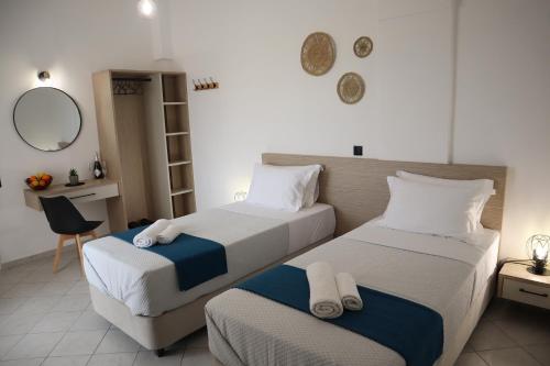 Ένα ή περισσότερα κρεβάτια σε δωμάτιο στο Pension St.George Rooms & Studios