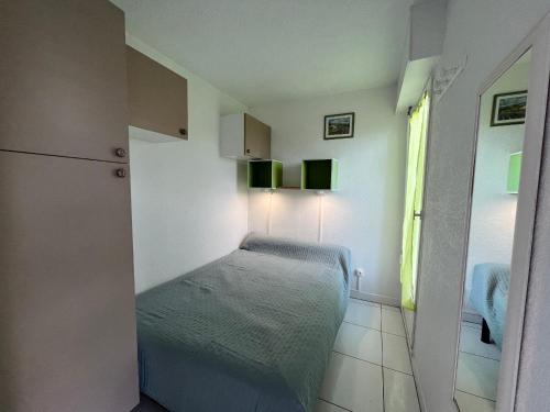 Appartement 2P cabine, face plage, clim, parking privatif