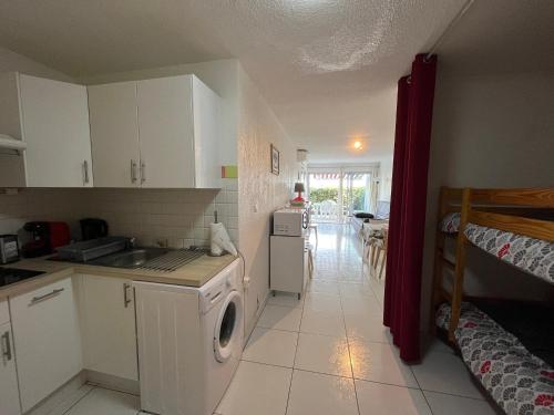 Appartement 2P cabine, face plage, clim, parking privatif
