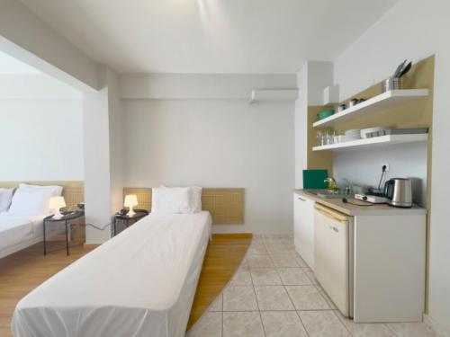Ένα ή περισσότερα κρεβάτια σε δωμάτιο στο Seagull apartments by halu! Building B