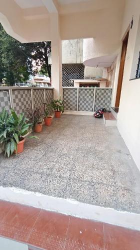 a patio of a house with potted plants at Chandrajyoti Villa 5 Ground floor Villa in Nagpur