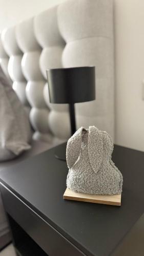 a black table with a lamp on top of it at PureNature Appartement in Obersontheim