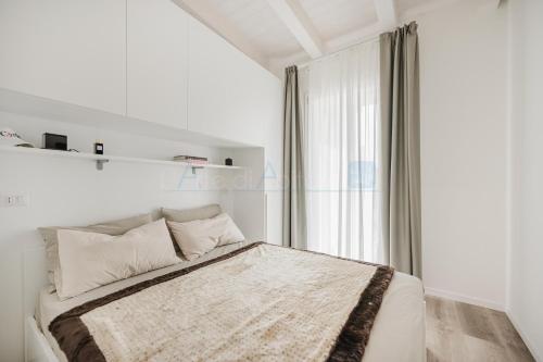 Postel nebo postele na pokoji v ubytování Wave Island EB F17