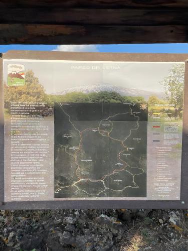 a sign for a interpretive sign at a park at Casa Annunziata - Bronte in Bronte