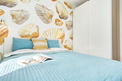 Ένα ή περισσότερα κρεβάτια σε δωμάτιο στο Staywin Apartments Chmielna Park