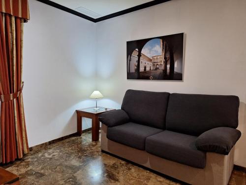 a living room with a couch and a table at Cazorla LIVE in Cazorla