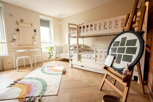Katil atau katil-katil dalam bilik di Ouder-kind B&B Droomzacht - Natuurkamer