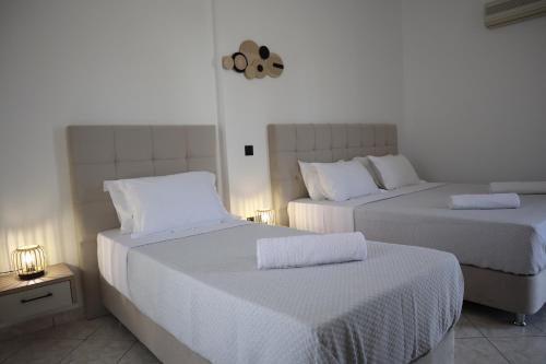 Ένα ή περισσότερα κρεβάτια σε δωμάτιο στο Pension St.George Rooms & Studios