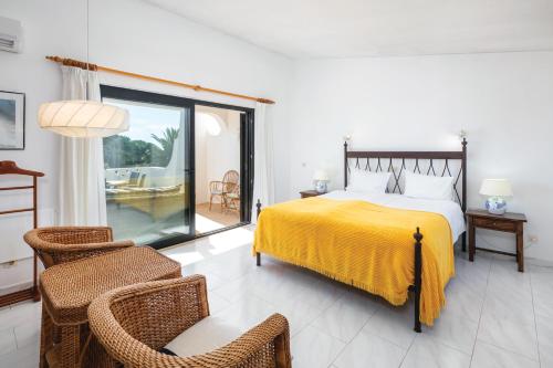 Giường trong phòng chung tại Casa Catarina