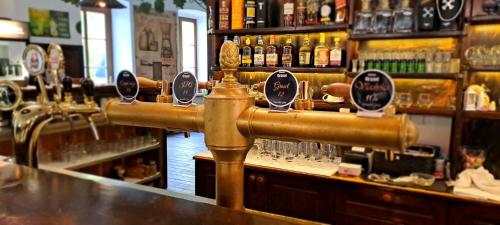 Lounge nebo bar v ubytování Pivovar a Penzion GRASEL