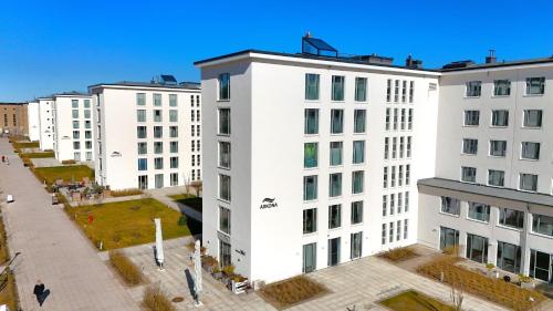 an overhead view of a white building at Haus Arkona - Apartment Seestern - 5 2 in Prora