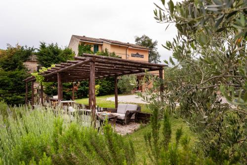 Vonkajšia záhrada v ubytovaní Locanda Tanè