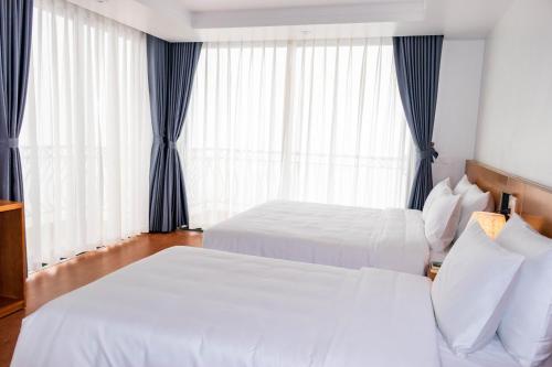Ένα ή περισσότερα κρεβάτια σε δωμάτιο στο Comay Sapa House