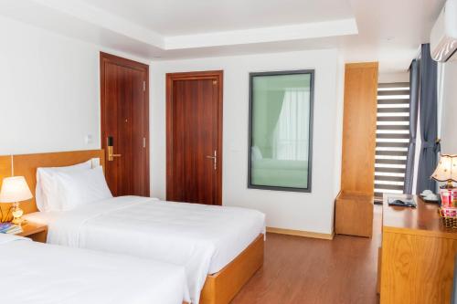 Ένα ή περισσότερα κρεβάτια σε δωμάτιο στο Comay Sapa House