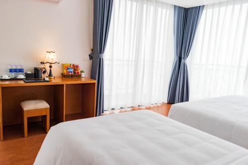 Ένα ή περισσότερα κρεβάτια σε δωμάτιο στο Comay Sapa House