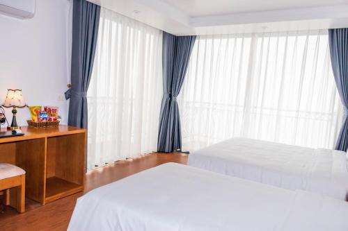Ένα ή περισσότερα κρεβάτια σε δωμάτιο στο Comay Sapa House