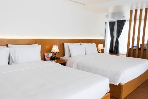 Ένα ή περισσότερα κρεβάτια σε δωμάτιο στο Comay Sapa House