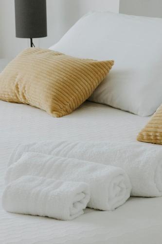 Ένα ή περισσότερα κρεβάτια σε δωμάτιο στο BnB Nuova Vita