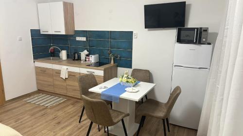 Η κουζίνα ή μικρή κουζίνα στο SpaGo Apartment