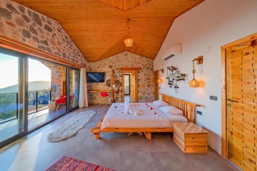 Ένα ή περισσότερα κρεβάτια σε δωμάτιο στο Villa Babadağ Esintisi Fethiye
