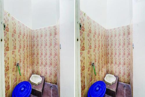 Ένα μπάνιο στο OYO Life 91606 Nadin Guest House Syariah
