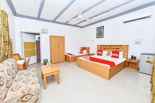 Postel nebo postele na pokoji v ubytování OYO 138 Gulf Sand Motel
