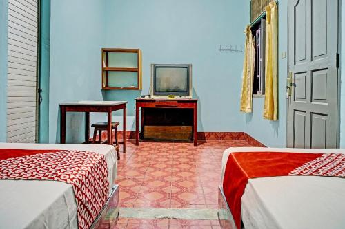 Postel nebo postele na pokoji v ubytování SPOT ON 91637 Hotel Adela