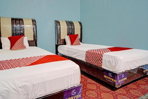 Postel nebo postele na pokoji v ubytování SPOT ON 91637 Hotel Adela