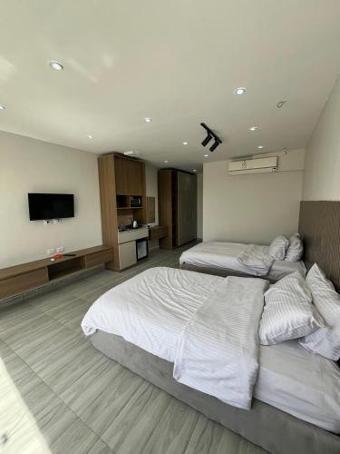 Postel nebo postele na pokoji v ubytování Pyramid hotel