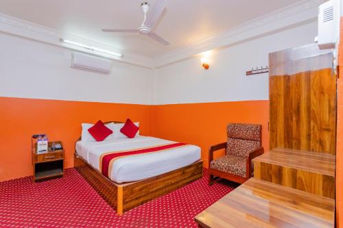 Una cama o camas en una habitación de OYO 797 Hotel Aakansh