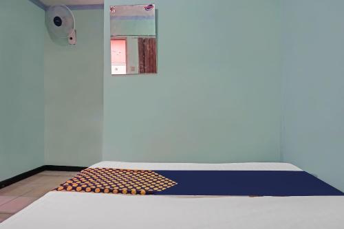 Фотография из галереи Hotel O Amazon Homestay Syariah 2 в городе Сукабуми