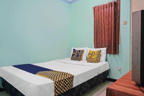 Фотография из галереи Hotel O Amazon Homestay Syariah 2 в городе Сукабуми