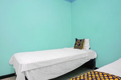 Фотография из галереи Hotel O Amazon Homestay Syariah 2 в городе Сукабуми