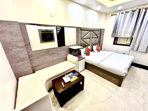Postel nebo postele na pokoji v ubytování Hotel Amrit Villa