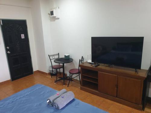 TV a/nebo společenská místnost v ubytování Monkey Apartment