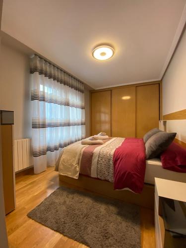 Una cama o camas en una habitación de Horizon Duplex by ARoom VUT-LE-1414