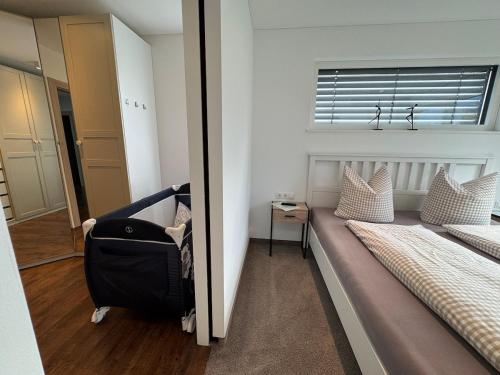 a room with two beds and a window at Inntal Alpin Apartments - Hohe Munde in Telfs