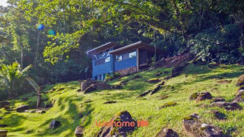 a house on top of a hill at Chale na Mata Atlantica com rio e imersao natural in Garuva
