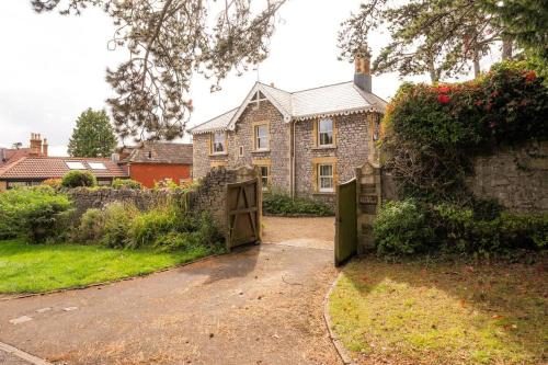 a house with a gate in front of it at The Mews Flat, near Clifton Suspension Bridge with off-street parking in Bristol