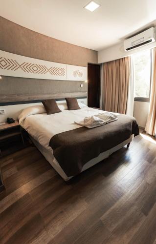 Postel nebo postele na pokoji v ubytování Hotel Belén