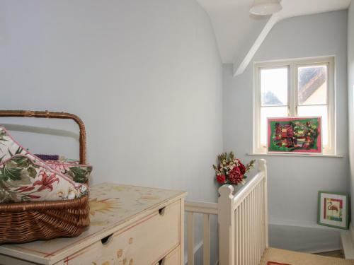 a room with a dresser and a window at 10 Upper Linney in Ludlow