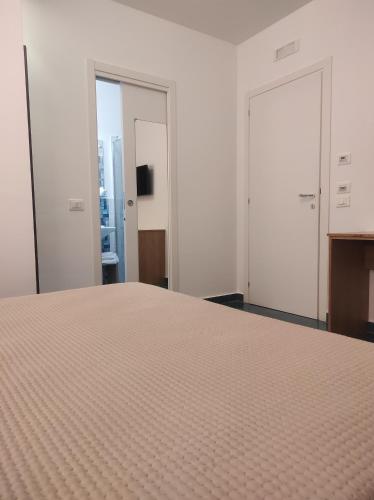 Letto o letti in una camera di Residenza Porta Romana
