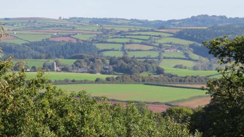 a view of the countryside from the hills at Bradleigh Down Holidays Apartment with Private Pool and Hot Tub in Tiverton