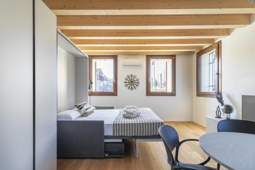 Postel nebo postele na pokoji v ubytování Molino 2 by WelcHome