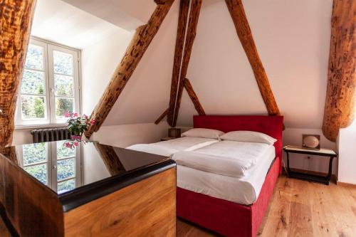Giường trong phòng chung tại Mansarda Luxury