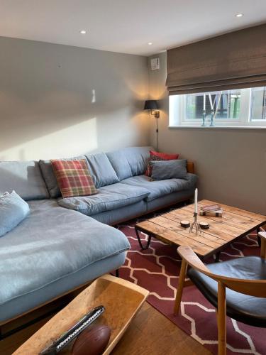 a living room with a couch and a coffee table at Ski lodge Åre by in Åre