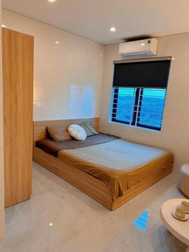 Ένα ή περισσότερα κρεβάτια σε δωμάτιο στο Top apartment