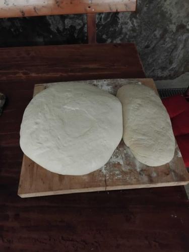 a ball of dough on a cutting board at La sosta di Fano in Reggello