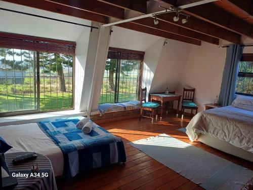 Ένα ή περισσότερα κρεβάτια σε δωμάτιο στο Esperanza Countryside Accomodation